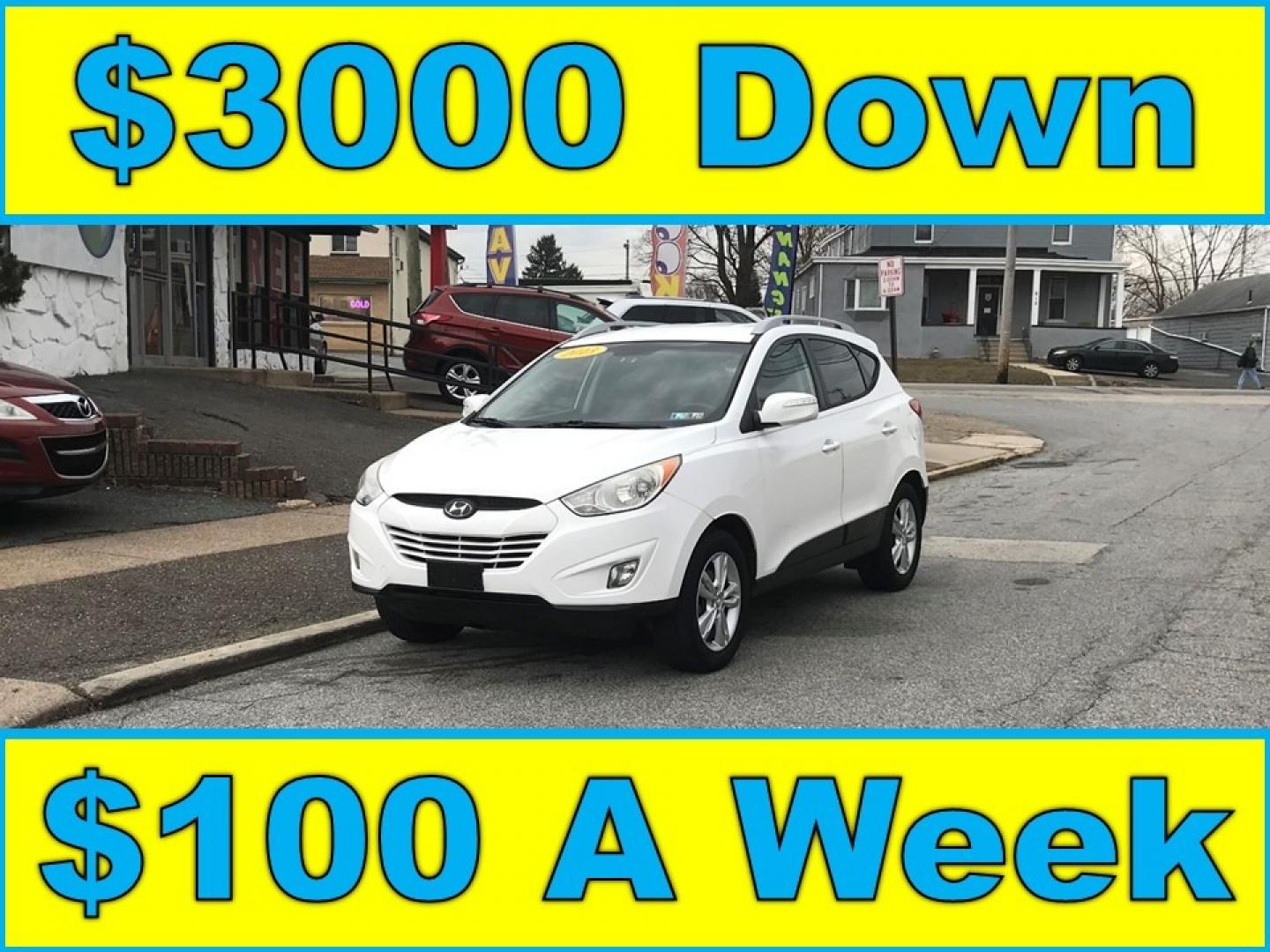 2013 White /Black Hyundai Tucson GLS (KM8JUCAC9DU) with an 2.4 V4 engine, Automatic transmission, located at 577 Chester Pike, Prospect Park, PA, 19076, (610) 237-1015, 39.886154, -75.302338 - Photo#0